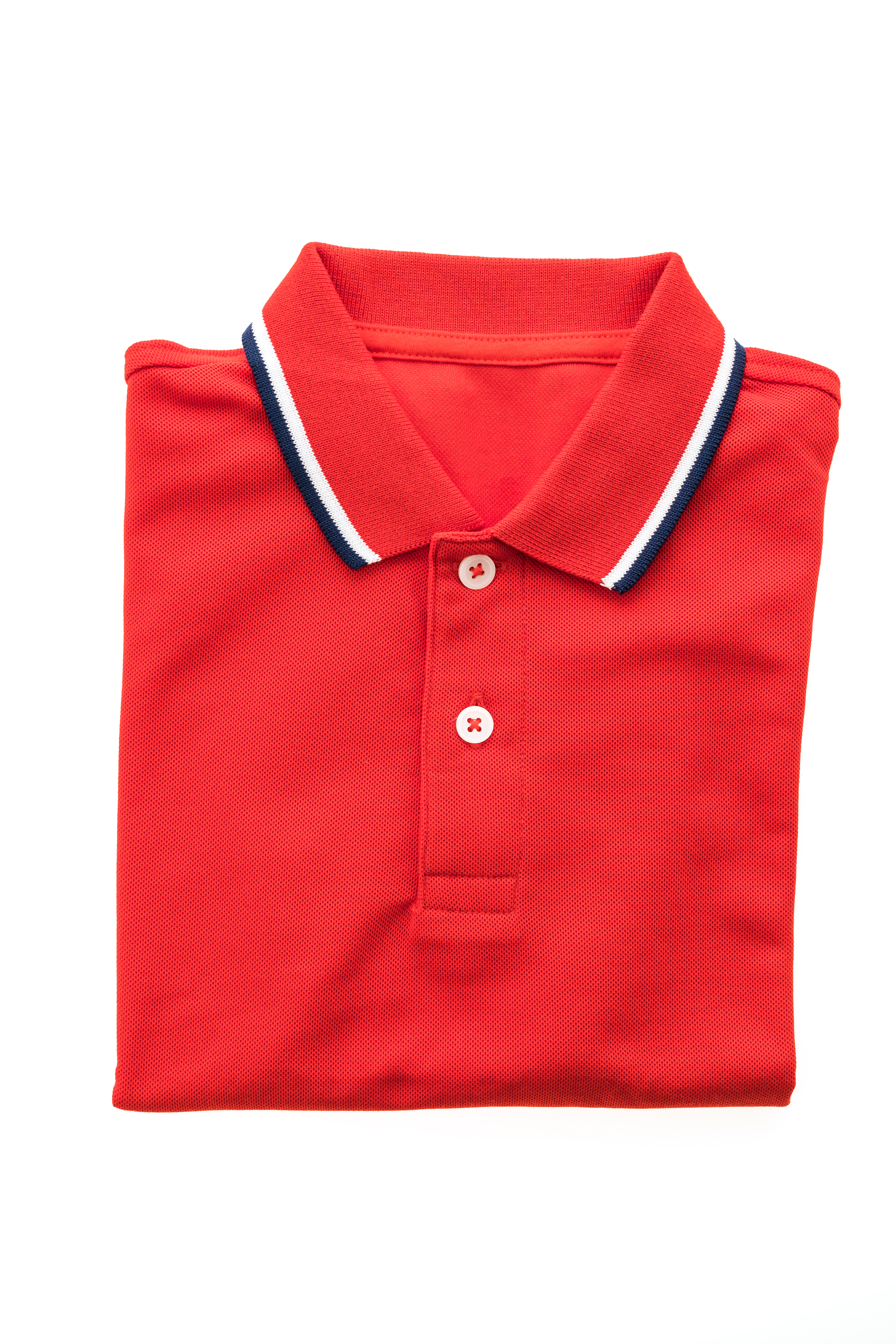 Folded red polo shirt with striped collar
